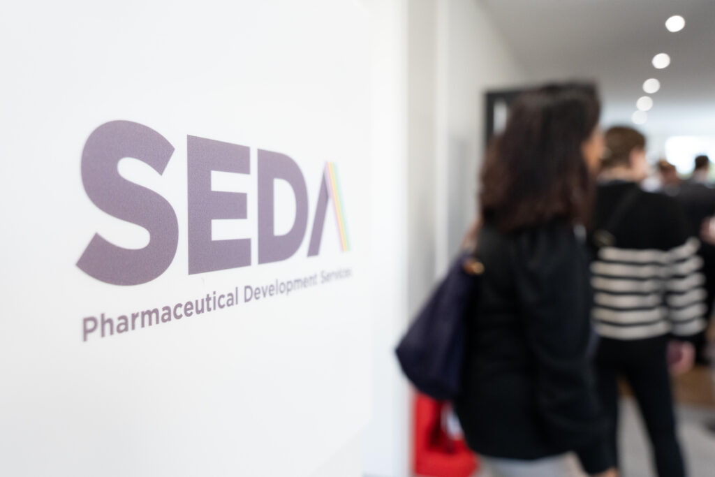 Seda logo with blurred background of open day